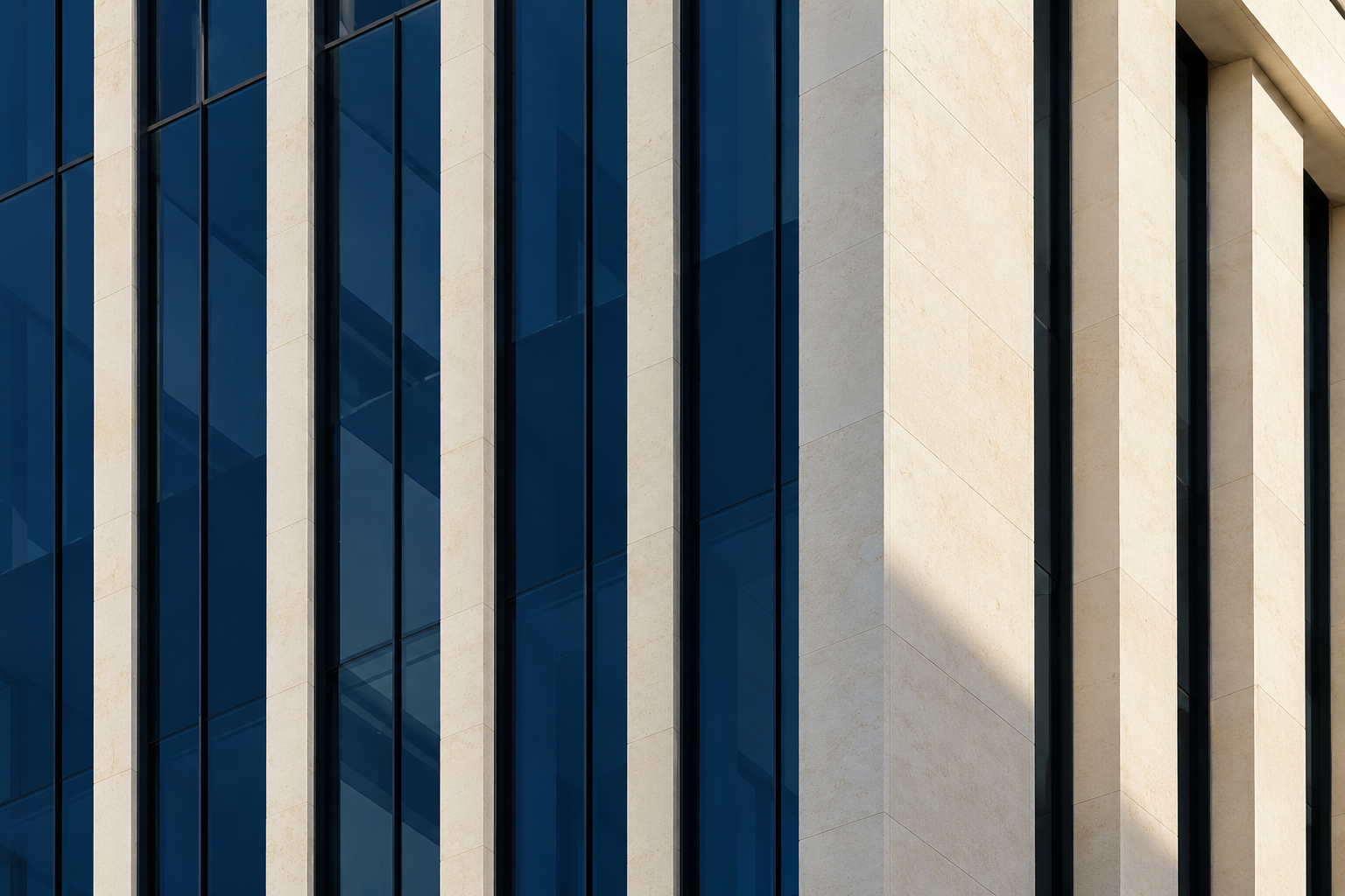 Light and shadow on a modern glass office facade
